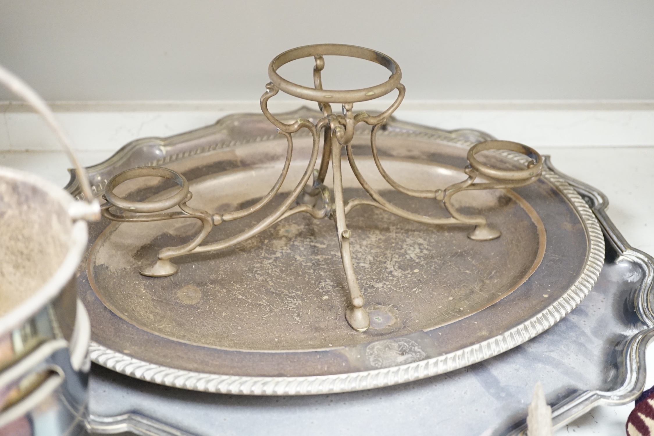 Three plated trays, a cased three piece mother of pearl handled cutlery set, etc.
